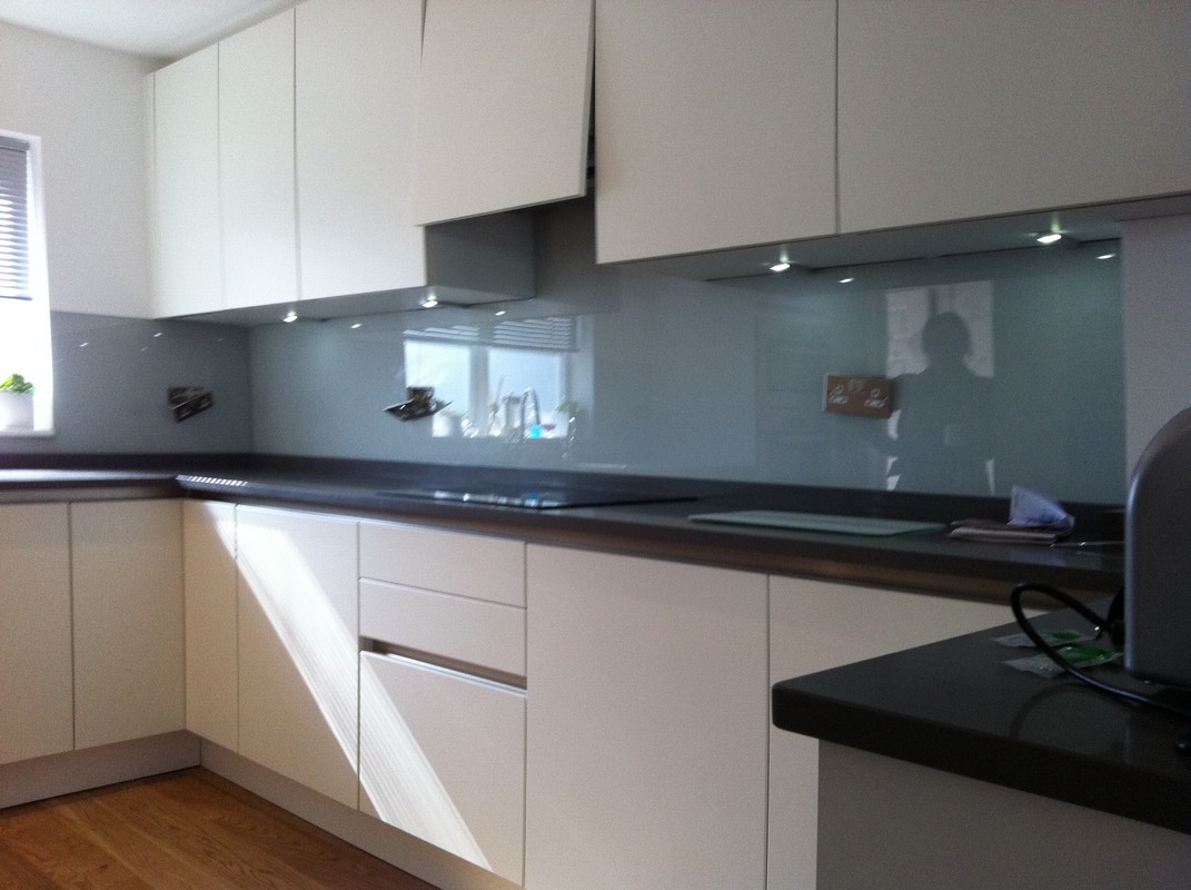 Grey glass kitchen splashback with LED lighting in High Wycombe
